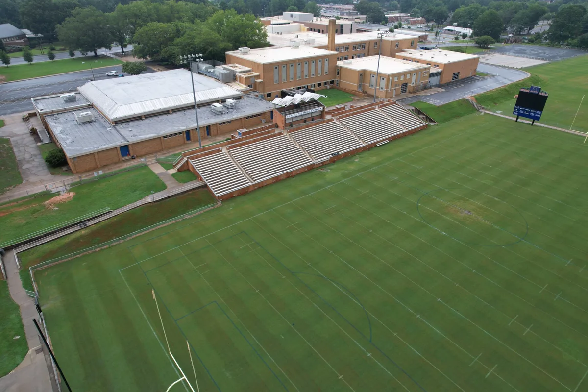 Aerial drone photo of an athletic field and stadium